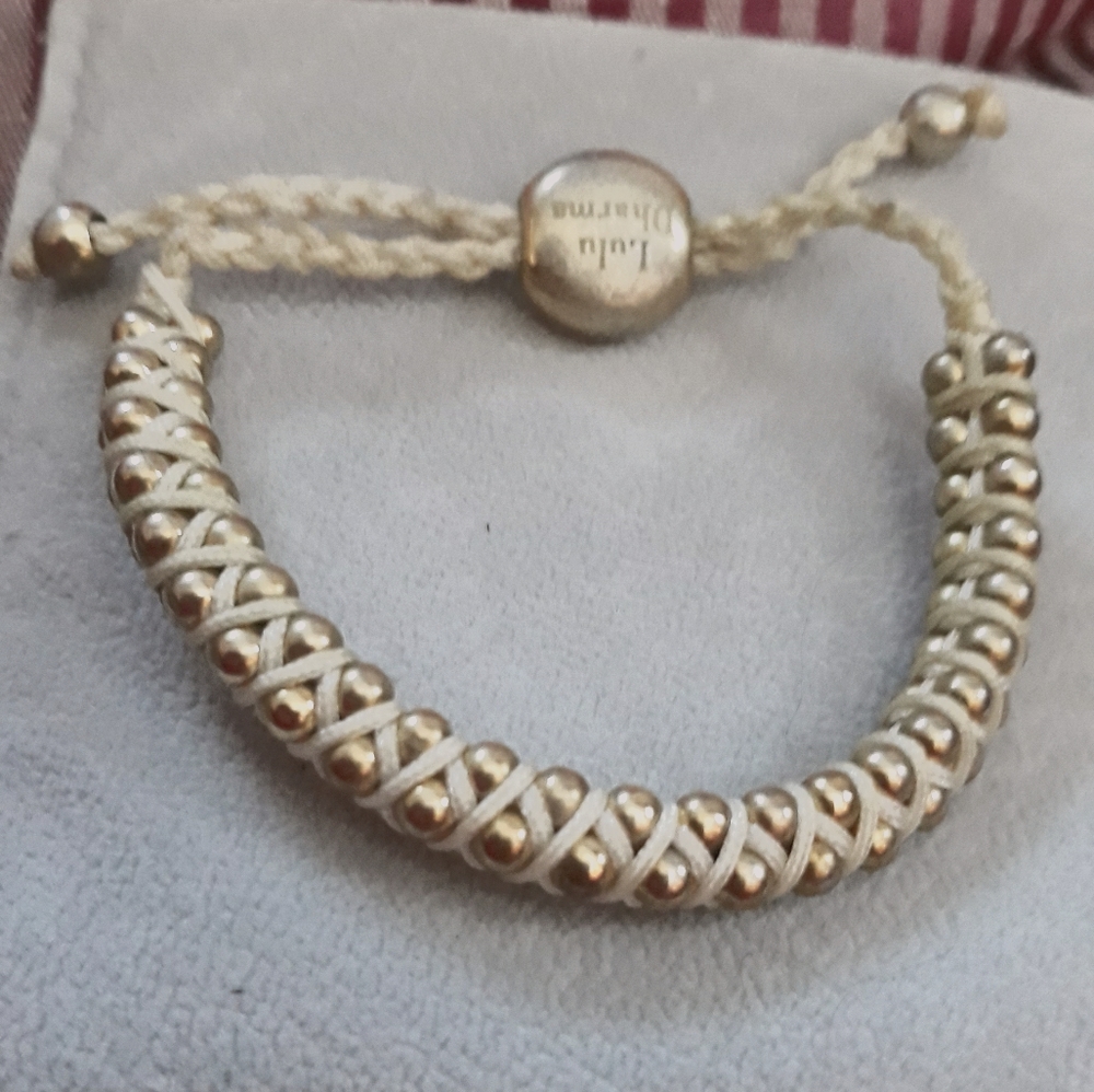 LuLu Dharma Macrame and gold beaded Bracelet